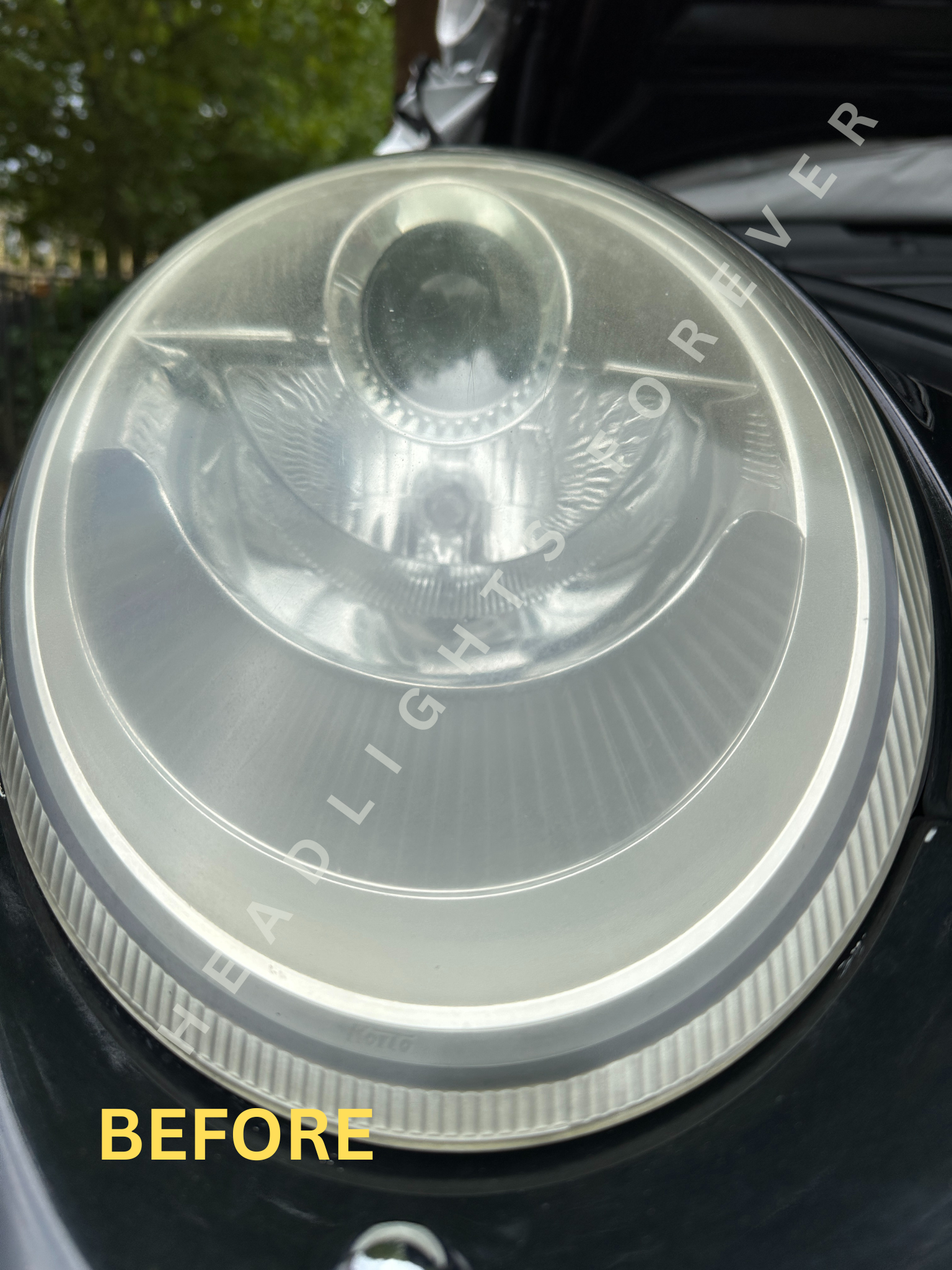 Porsche 911 headlight before restoration